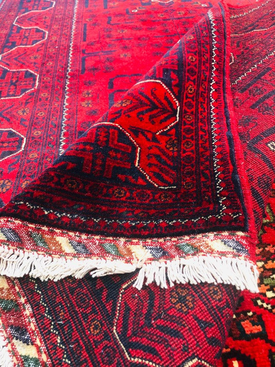 Hand knotted Rug has a light and dark side which is a trademark of Handmade Rugs