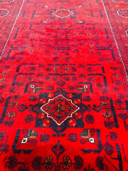 Hand knotted Rug has a light and dark side which is a trademark of Handmade Rugs